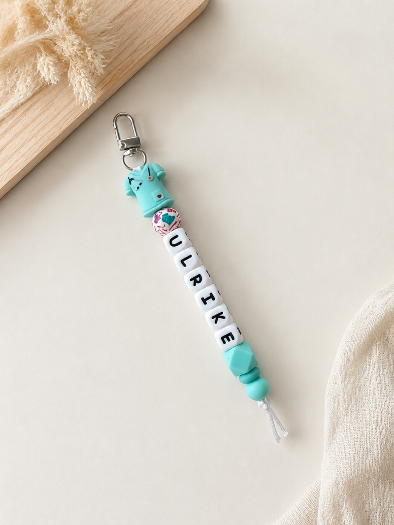 Sleutelhanger met naam ‘Care Shirt’