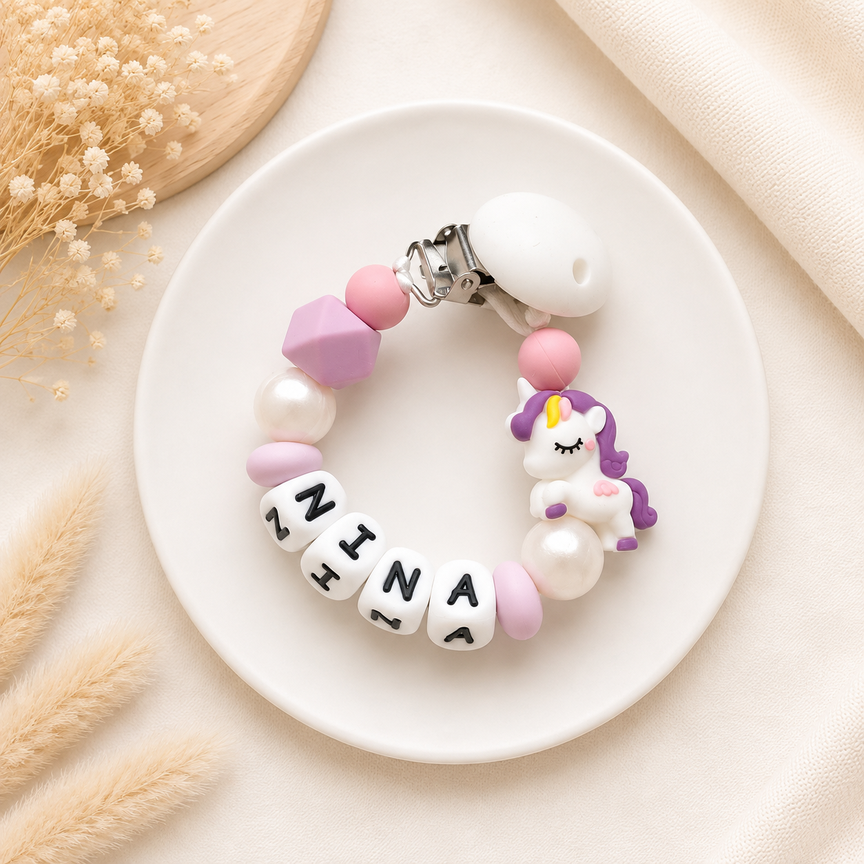 Speenkoord met naam Dream Unicorn met unicorn en roze kralen