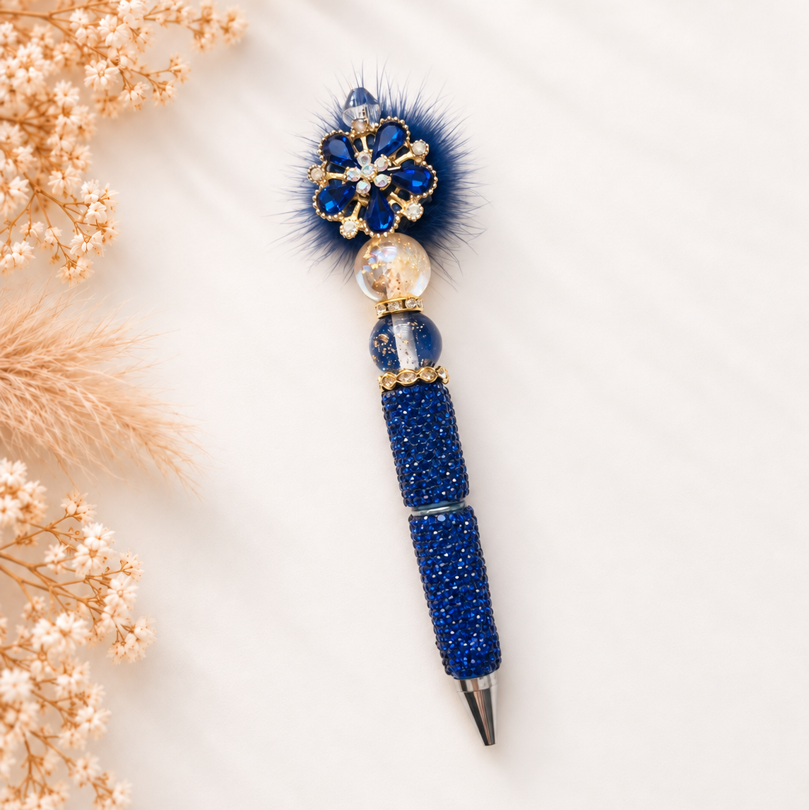 Luxe kralenpen Lumière in blauwe tinten met fonkelende bloem, gouden details en sierlijke kralen