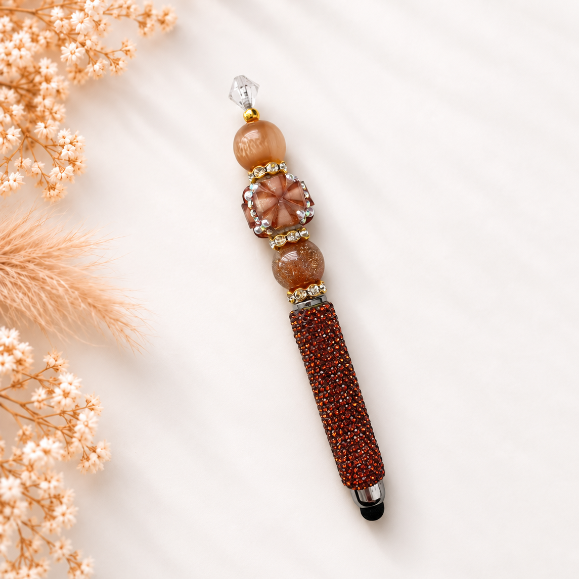 Luxe touchpen Amber Luxe in warme amber- en cognactinten met gouden details en glinsterende afwerking