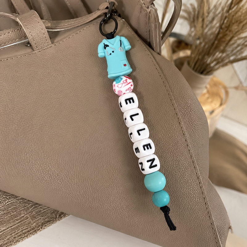 Sleutelhanger met naam ‘Care Shirt’